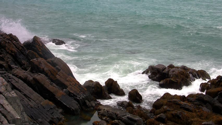 waves breaking on the rocks, norway