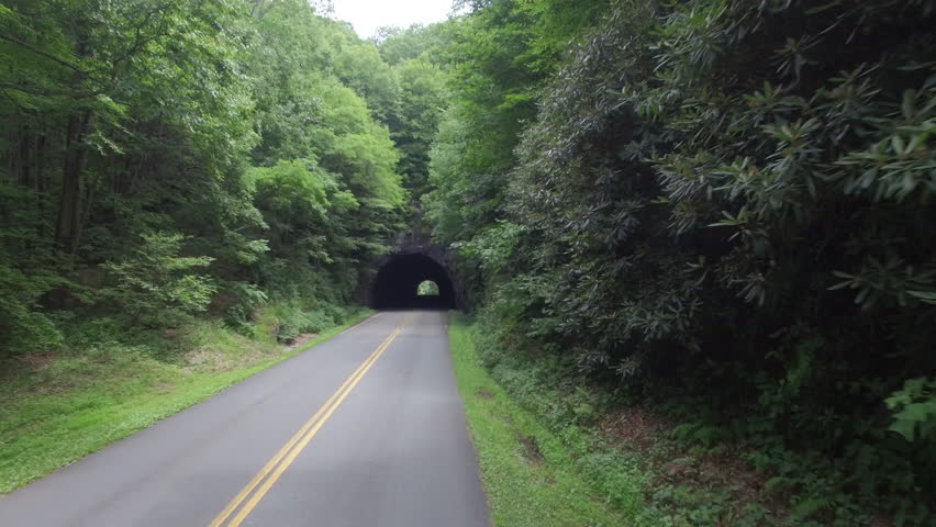 Approaching the Tanbark Ridge Tunnel on Blue Ridge Parkway, North Carolina, known as the Little Switzerland Tunnel.