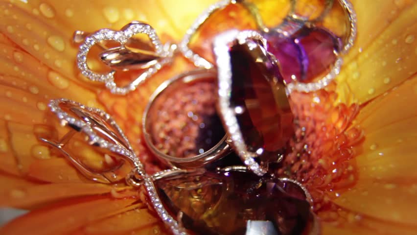 Jewelry in a flower rotating.