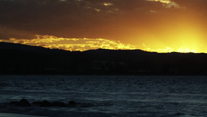 Orange Setting Sun Over the Bay