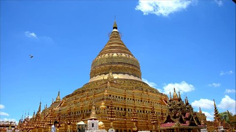 Traveller and Burmese people come to Shwezigon Pagoda at Bagan in Myanmar