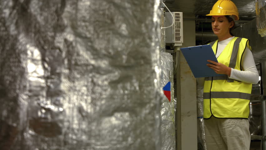 Engineer working in temperature control room in high quality 4k format