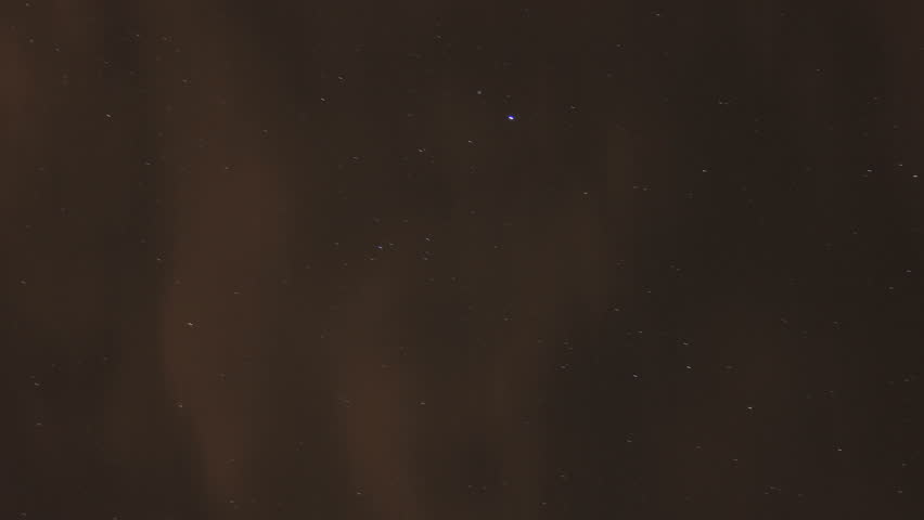 This is a time lapse shot of the night sky.  The stars seem to spin as the earth