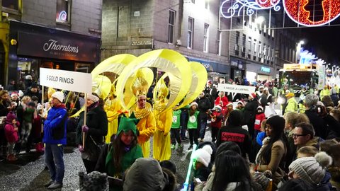 ABERDEEN SCOTLAND - 29 November 2015: Crowded people and The Christmas parade on the Union Street in Aberdeen, Scotland, to celebrate the upcoming Christmas on 29 November 2015.
