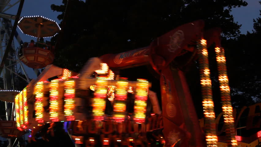 Spinning carousel in night