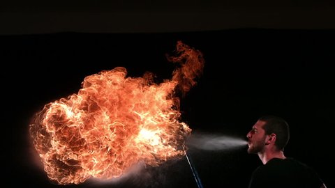 Cinemagraph - Firebreather, slow motion. Looping Motion Photo. 