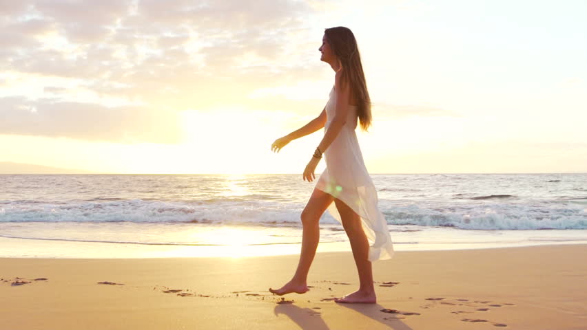 Beautiful Woman Sunset Walk on the Beach on Resort Vacation Island. Model Girl Spinning in SLOW MOTION Getting Feet Wet Splashing Royalty-Free Stock Footage #13121858
