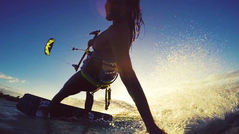 Beautiful Girl Having Fun Summer Extreme Water Sports Kite Surfing in Bikini. Slow Motion.