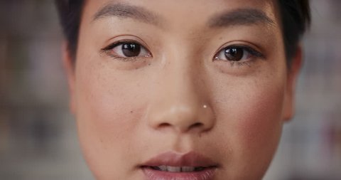 Dramatic Close up of beautiful Asian woman happy portrait happy smiling slow motion soft natural light on face center crop