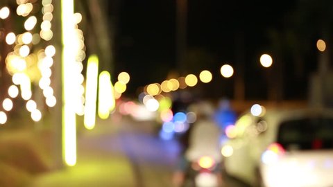 Defocused night traffic lights in Bangkok, Thailand