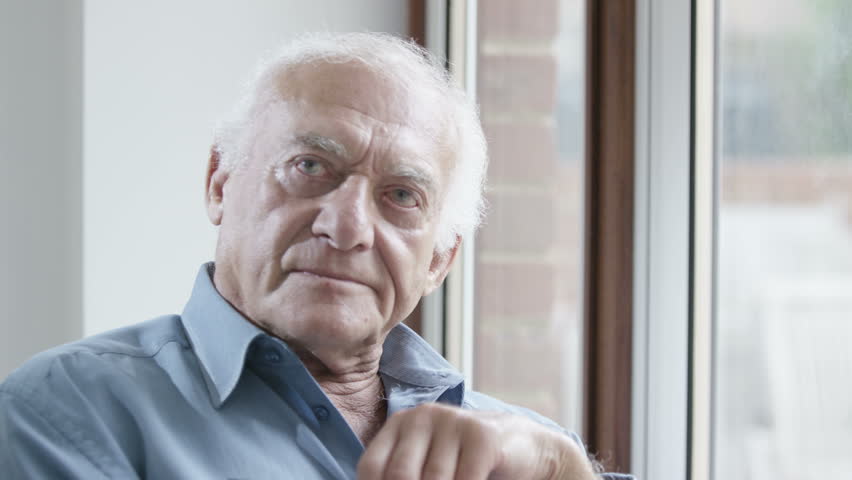 4K Portrait of sad elderly man sitting by the window. Shot on RED Epic. | Shutterstock HD Video #13174808