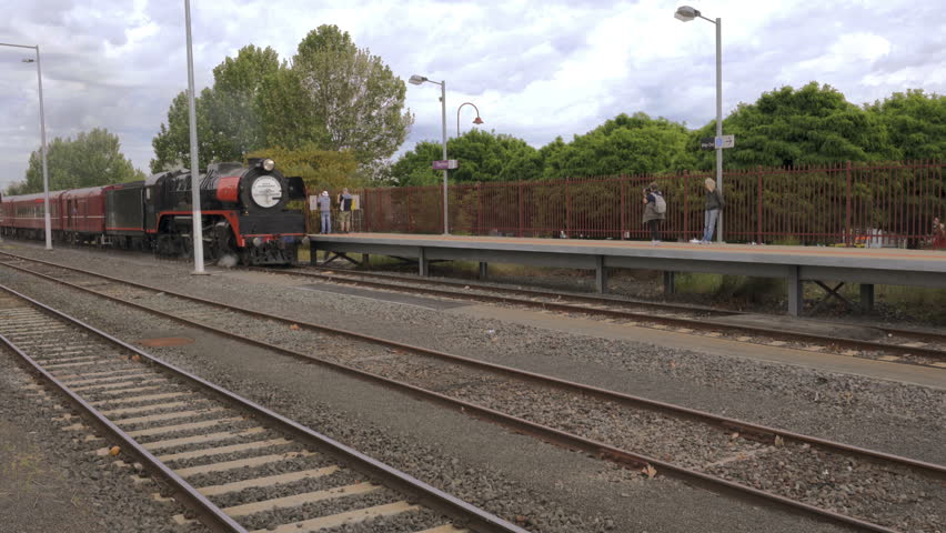 Melbourne, Australia - Oct 17 2015: 4k video of a vintage steam train arriving at the Seymour train station in Melbourne, Australia