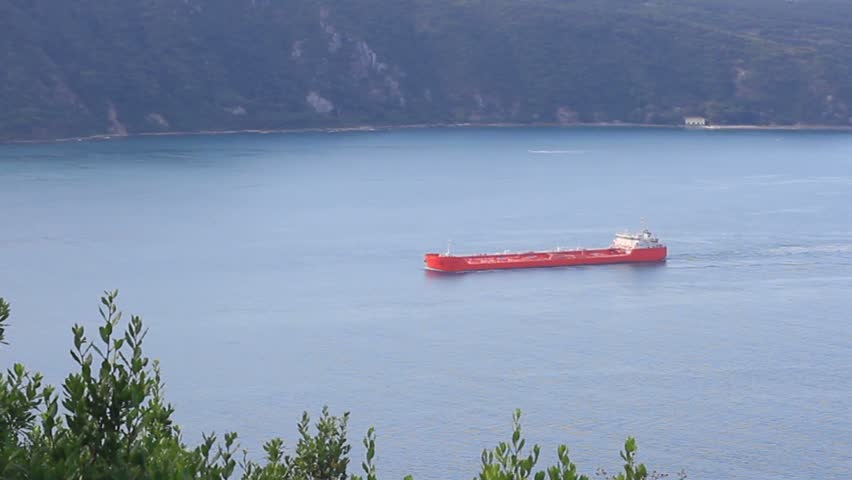 Large red tanker ship on route to Bosporus sea 