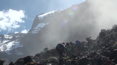 Group of people are climbing to Kilimanjaro (foggy). Tanzania 