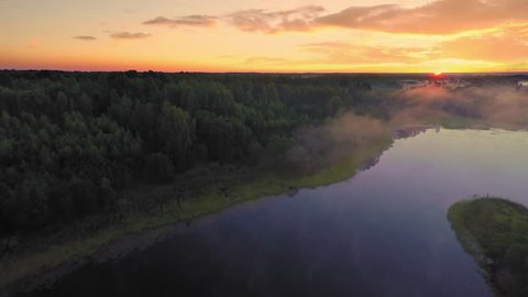 Forest lake at dawn (Aerial Drone flights), august 2015