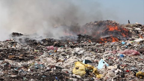 Burning garbage dump, ecological pollution