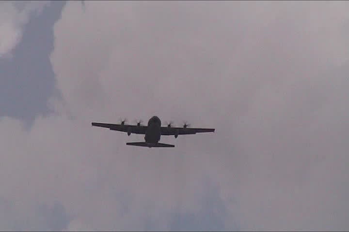 Paratroopers down from the airplane to the battlefield