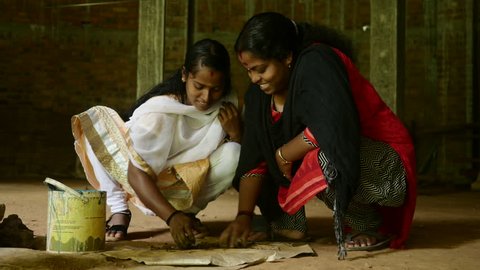 Indian Sisters Family Making Handmade Clay Jewellery 