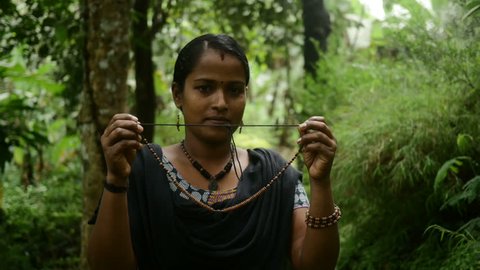 Indian Woman Presenting Handmade Clay Jewellery 