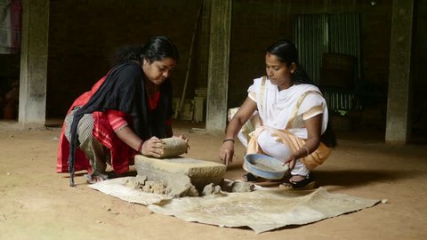 Indian Family Making Handmade Clay Jewellery 