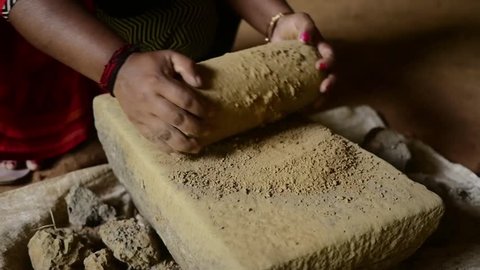 Old Indian Woman Making Handmade Clay Jewellery