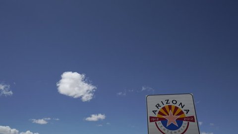 A welcome to Arizona sign
