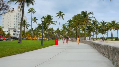 MIAMI BEACH - DECEMBER 8: Stock video of the pedestrian path on Ocean Drive shot in the warm December weather December 8, 2015 in Miami Beach FL, USA