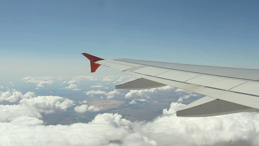 View on the Wing of airplane from window