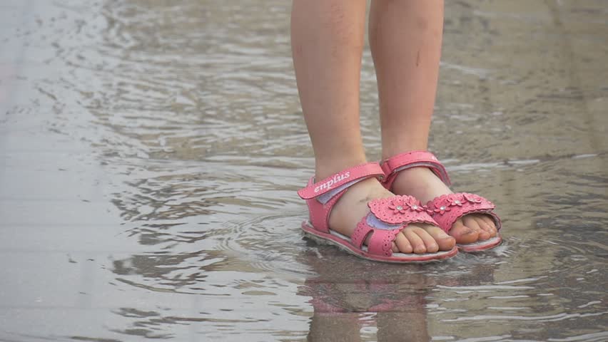 little girl in sandals