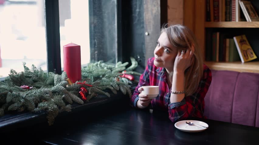 Woman drinking coffee