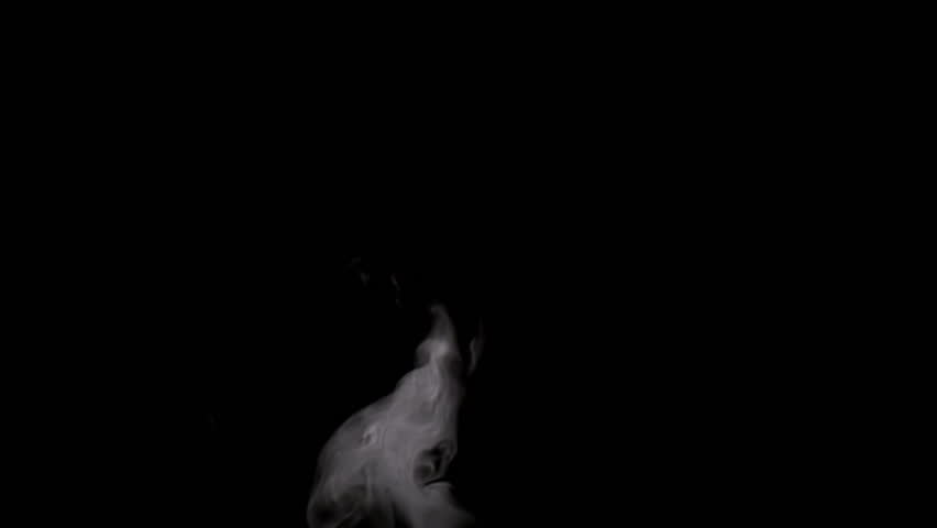 Slow Jet of Steam from a Cup. White smoke on black background. Motion at a rate of 240 fps | Shutterstock HD Video #13297220