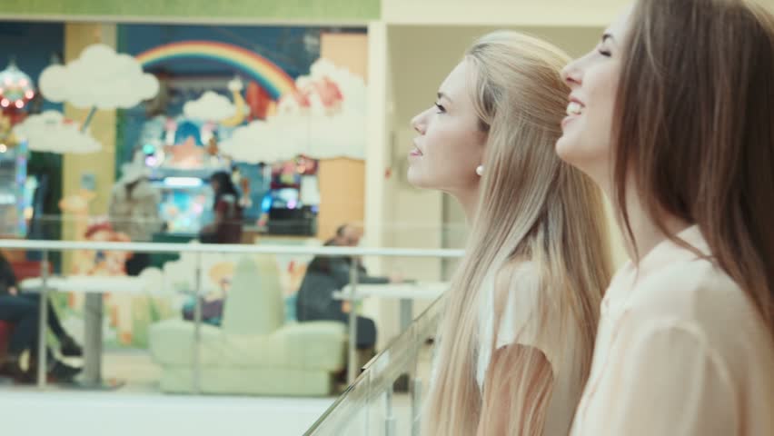 timelapse, Girlfriends talk in mall entertainment center