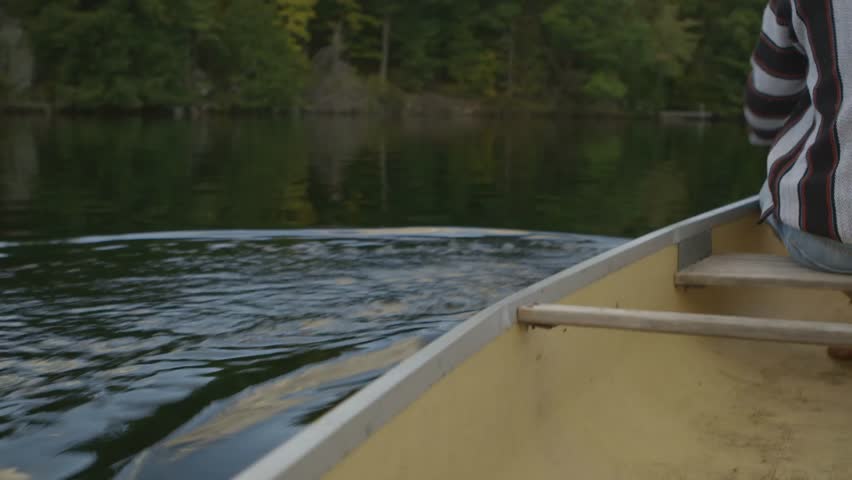 young man steers canoe oar part Stock Footage Video (100% Royalty-free ...