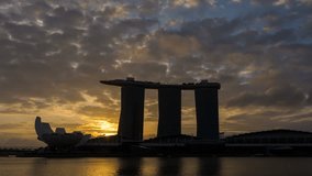 4K video time lapse : Singapore skyline at sunrise with 3 layer of moving cloud.