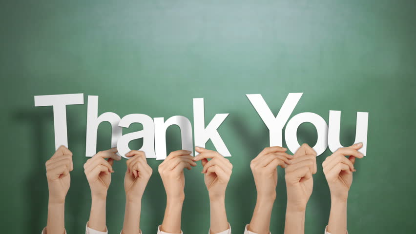 hands-holding-thank-you-against-chalkboard-stock-footage-video-100