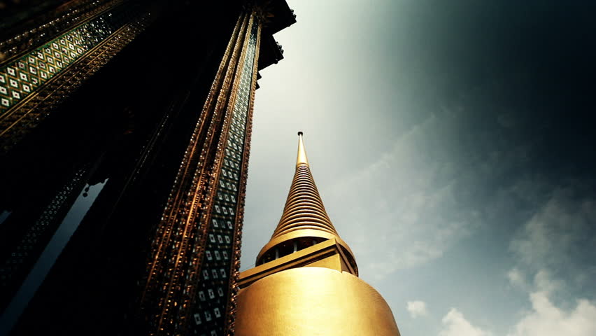 Richly ecorated golden buildings of grand palace temple in Bangkok