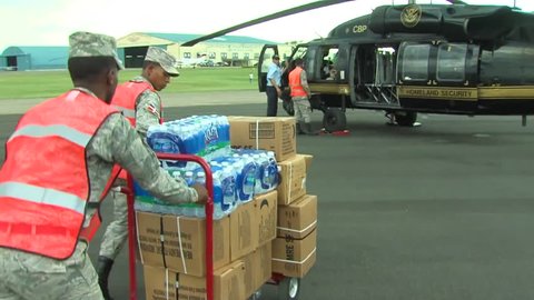 CIRCA 2010s - Medical personnel and relief supplies are flown into Haiti following the devastating earthquake in 2010.
