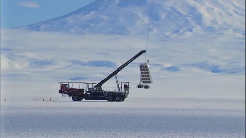 CIRCA 2010s - NASA launches an aerostatic weather balloon from McMurdo Station in Antarctica.