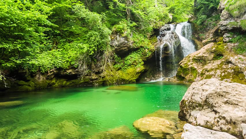 Loopable cinemagraph of raw footage of waterfall at the Vintgar gorge, beauty of nature, with river Radovna flowing through, near Bled, Slovenia Royalty-Free Stock Footage #13326683