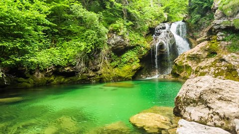 Loopable cinemagraph of raw footage of waterfall at the Vintgar gorge, beauty of nature, with river Radovna flowing through, near Bled, Slovenia