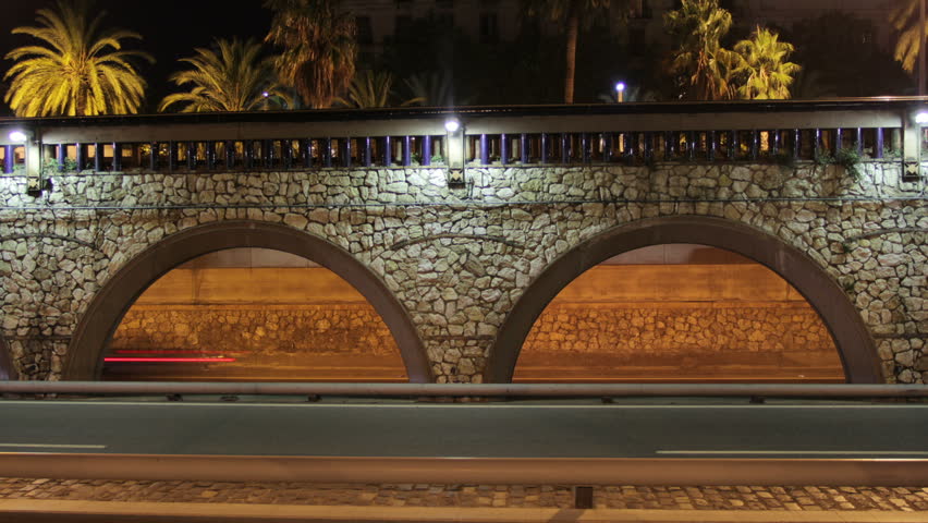 traffic at night in a tunnel in barcelona spain