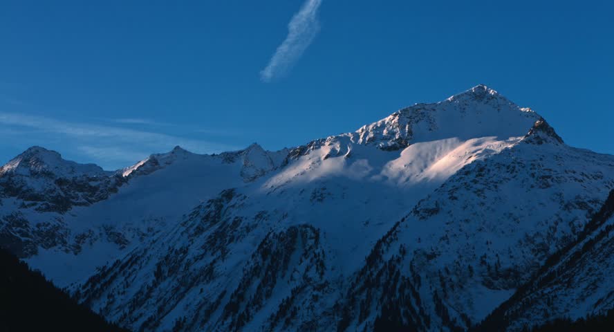 Sunrise in early march at the Rochterspitze in the upper Krimmler Achental valley, winter 2015, Austria, Blackmagic Cinema Kamera 4K, Raw, , shot in 30fps