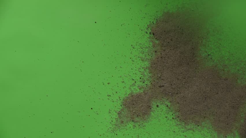 Heaps of Dry Sand is Flying at the Wind, Sand at Warm Airstream from the Dryer, Sand on Chroma Key, Sand on Green Background,Studio, Indoors, Nested Sequence Royalty-Free Stock Footage #13338752