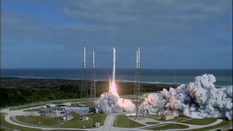 CIRCA 2010s - NASA Curiosity Rover lifts off from Kennedy Space Center aboard a Titan Rocket in November of 2011 with large crowds looking on.