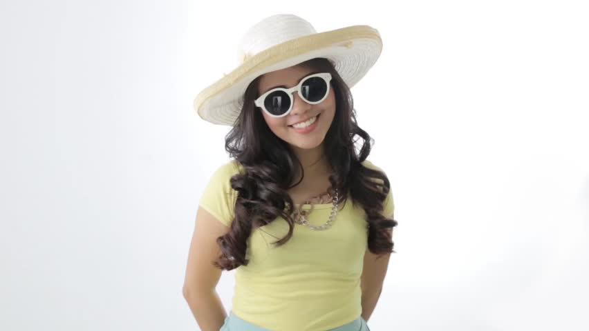 happy young asian woman showing thumb up to the camera