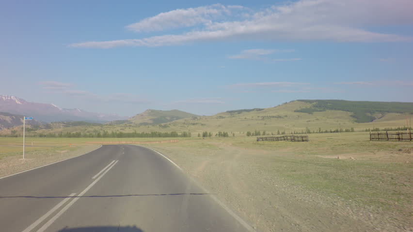 Beautiful Chuysky Trakt and snow caps of the North Chuya ridge.