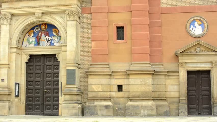 CZECH REPUBLIC, PRAGUE - JULY 24, 2015: view of the two entrance to the church in the countryside - pictures of saint people above the doors