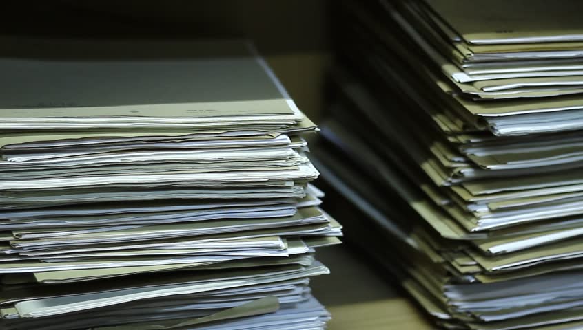 Stacks of old papers, old office documents, old paper work. Royalty-Free Stock Footage #13369100