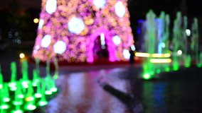 Christmas tree with christmas lights and fountain