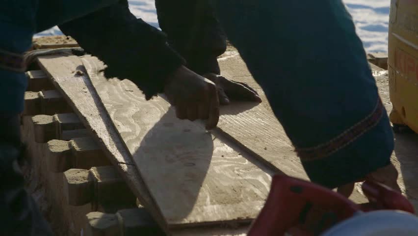 Arctic, Nunavut - Prepping wood to cut for snowmobile foot plate Part 1